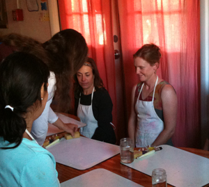 Kindergarten parents preparing to paint 'wet on wet.'